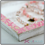 Close up of corner of dimensional paper tray to hold home decor items