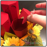 Candles in this 3D Thanksgiving centerpiece open to reveal storage space for gifts